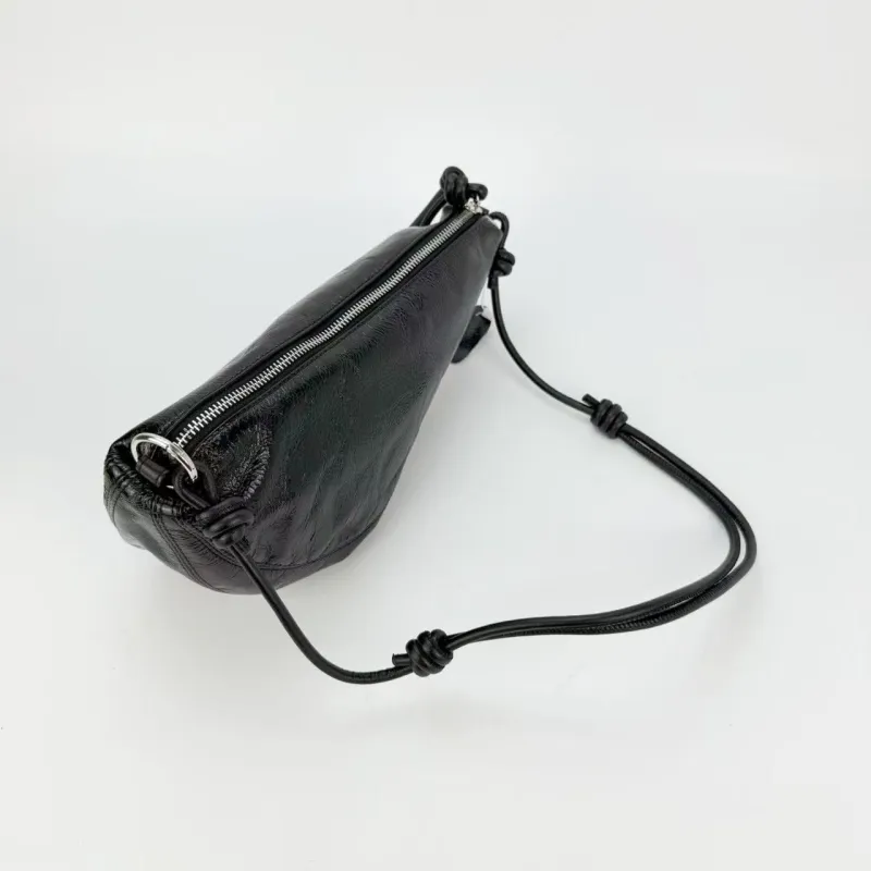 Black mini pouch bag case study sold by Anastasia
