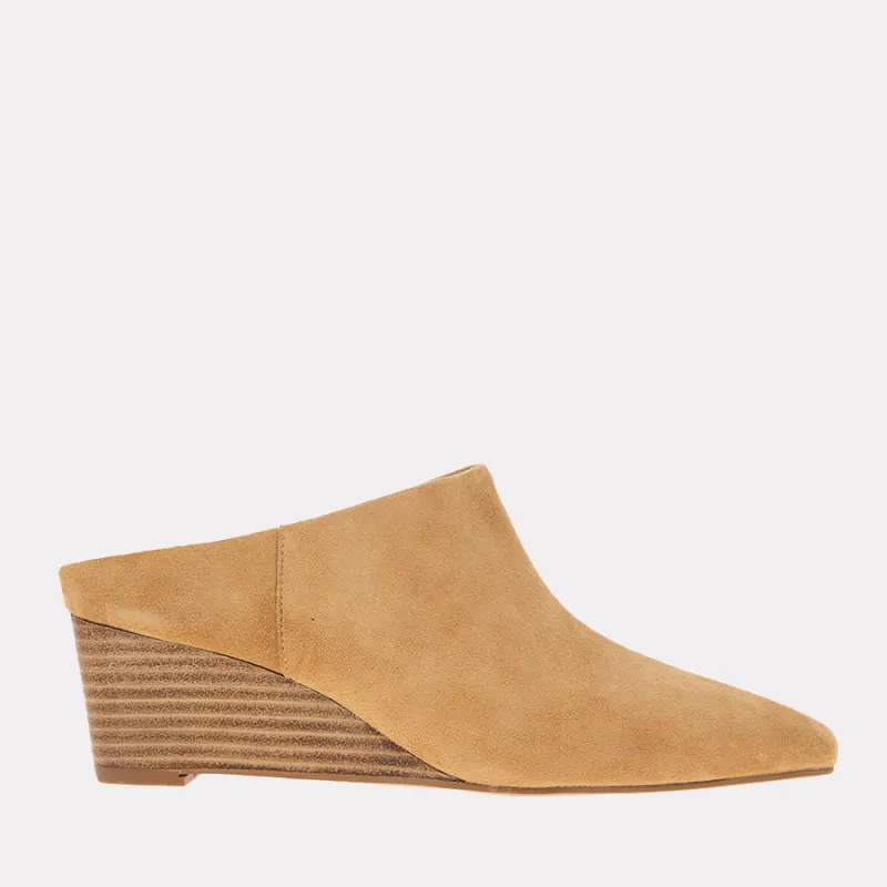 Wyatt Suede Mule sold by Andre Assous