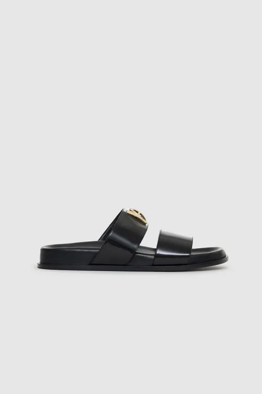 Parker Slides Monogram - High-Shine Black sold by Anine Bing
