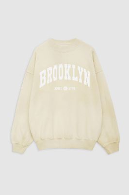 Jaci Sweatshirt University Brooklyn - Washed Faded Yellow sold by Anine Bing