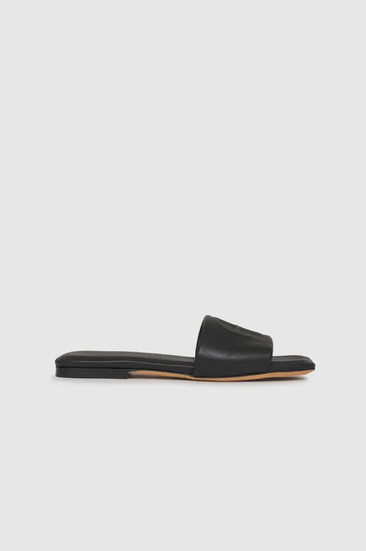 Ria Slides - Black Monogram sold by Anine Bing