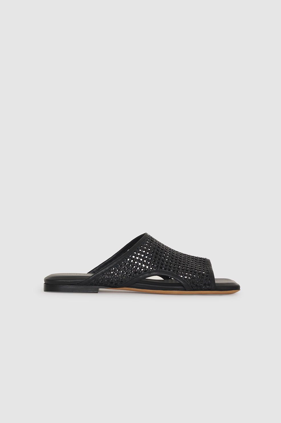 Hoxton Slides - Black sold by Anine Bing