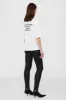 Avi Tee Paris - Ivory sold by Anine Bing