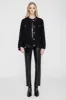 Elly Clutch - High-Shine Black sold by Anine Bing