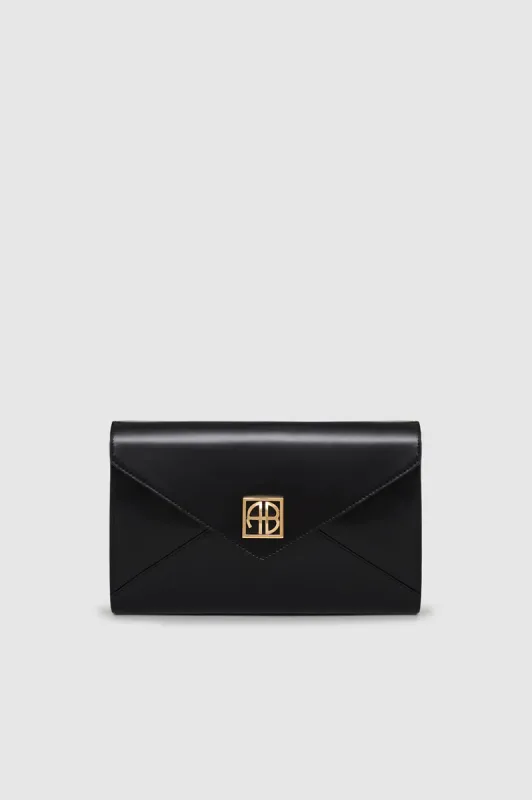 Elly Clutch - High-Shine Black sold by Anine Bing