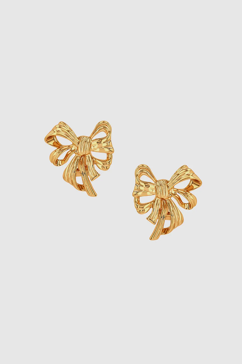 Bow Earrings - Gold sold by Anine Bing