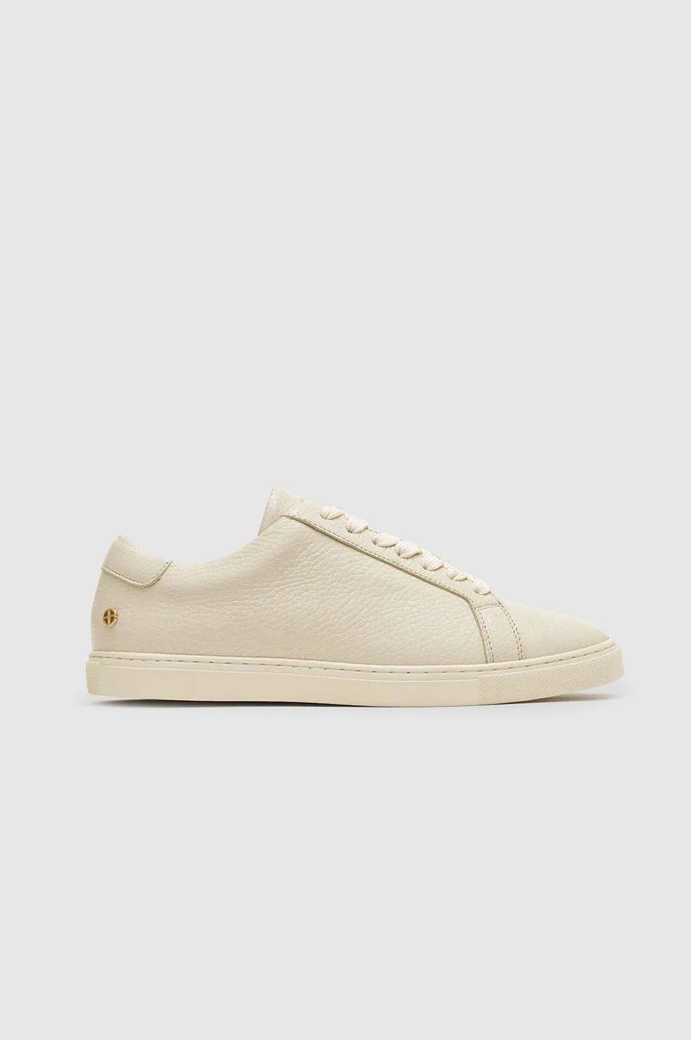 Liane Sneakers - Sand Pebbled sold by Anine Bing