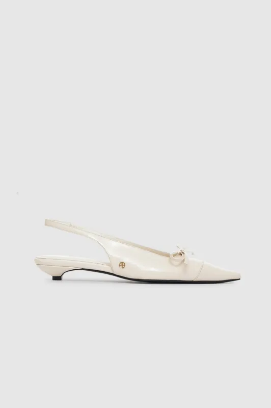 Zoey Slingback Heels - Bone Crinkled Patent sold by Anine Bing