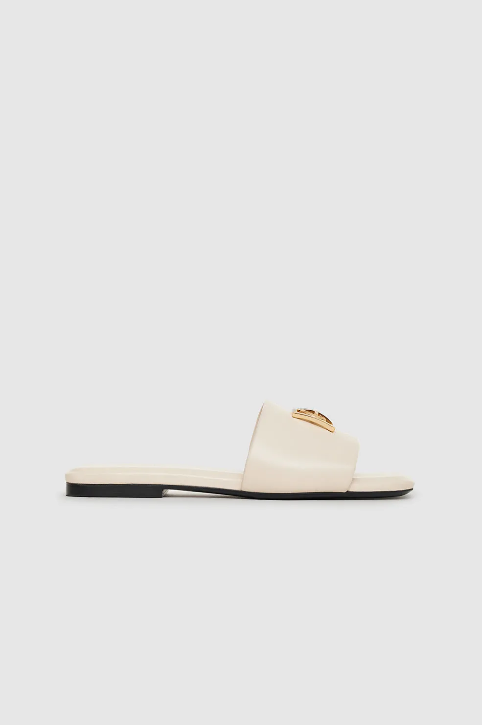 Ria Slides Monogram - Ivory sold by Anine Bing