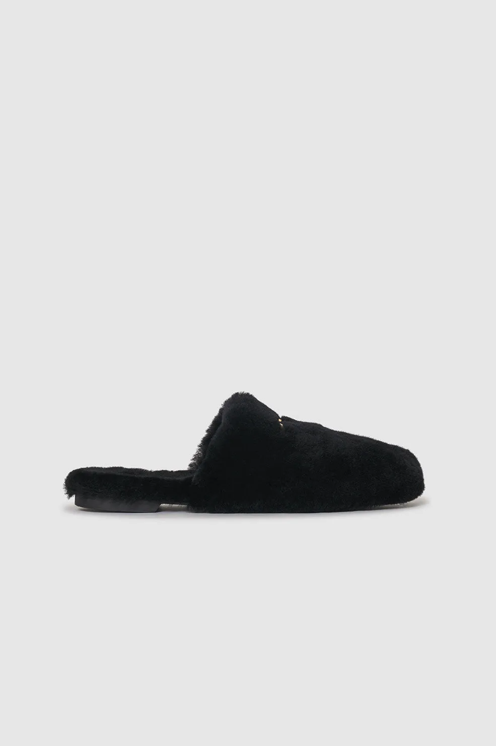 Shearling Mules - Black sold by Anine Bing
