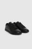 Liane Sneakers - Black Pebbled sold by Anine Bing