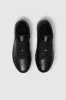 Liane Sneakers - Black Pebbled sold by Anine Bing