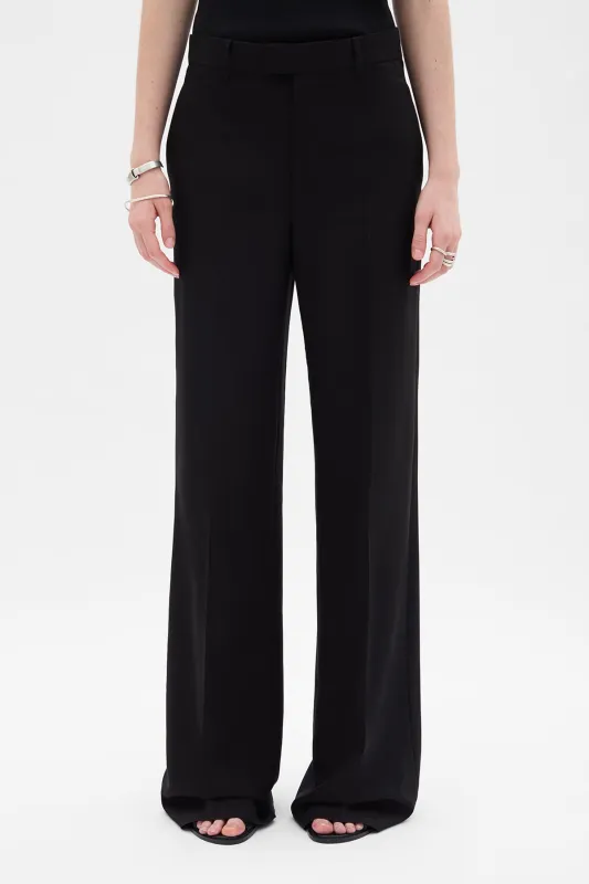 Maaike Flared Comfort Trousers sold by Ann Demeulemeester