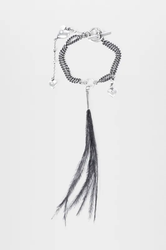 Revi Bracelet with Feather and Heart Charms made by Ann Demeulemeester