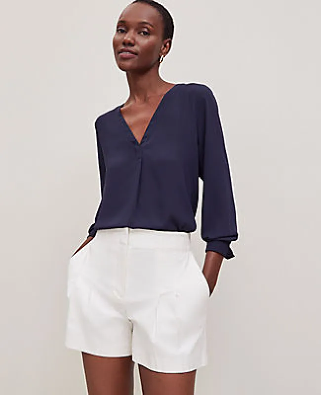 Ann Taylor Mixed Media Pleat Front Top sold by Ann Taylor