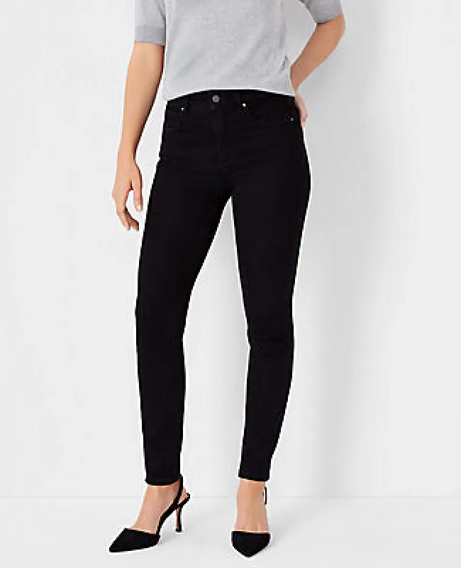Ann Taylor Petite Mid Rise Skinny Jeans in Jet Black Wash - Curvy Fit sold by Ann Taylor