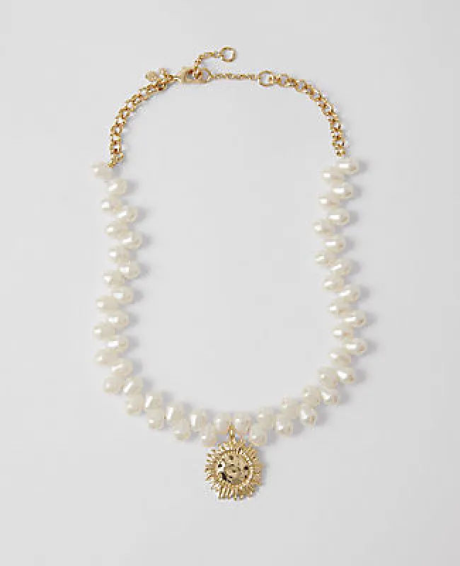 Ann Taylor Pearlized Sun Pendant Necklace sold by Ann Taylor