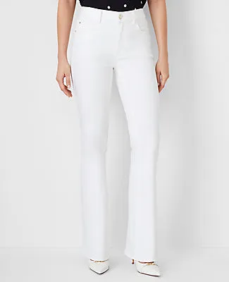 Ann Taylor Mid Rise Boot Jeans in White - Curvy Fit sold by Ann Taylor