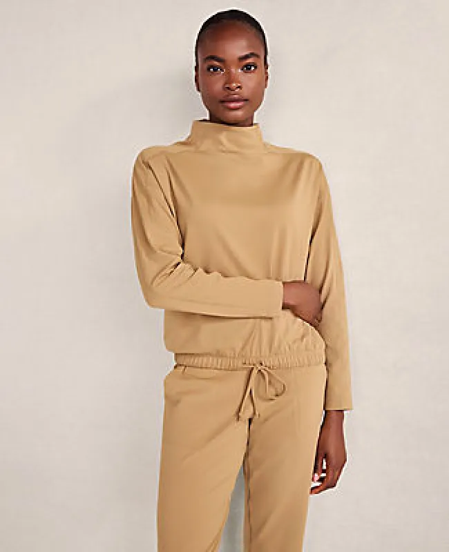 Ann Taylor Haven Well Within Balance Funnel Neck Top sold by Ann Taylor