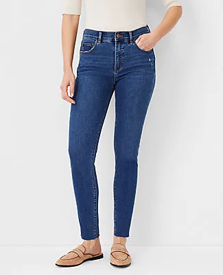 Ann Taylor Tall Sculpting Pocket Mid Rise Skinny Jeans in Mid Stone Wash sold by Ann Taylor