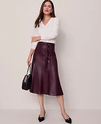 Ann Taylor Belted Faux Leather Skirt sold by Ann Taylor