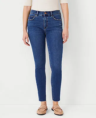 Ann Taylor Petite Curvy Sculpting Pocket Mid Rise Skinny Jeans in Mid Stone Wash sold by Ann Taylor