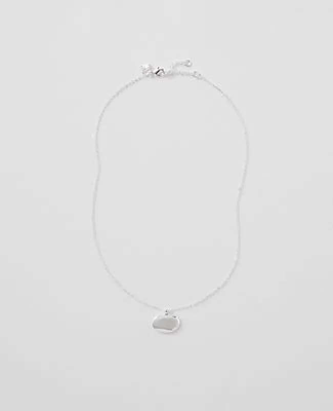 Ann Taylor Textured Metal Disc Pendant Necklace sold by Ann Taylor