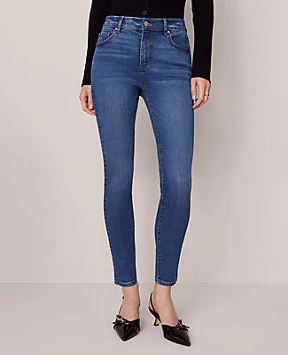 Ann Taylor Petite Mid Rise Skinny Jeans in Classic Wash — Curvy Fit sold by Ann Taylor