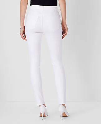 Ann Taylor Petite Mid Rise Skinny Jeans in White - Curvy Fit sold by Ann Taylor product image thumbnail 2