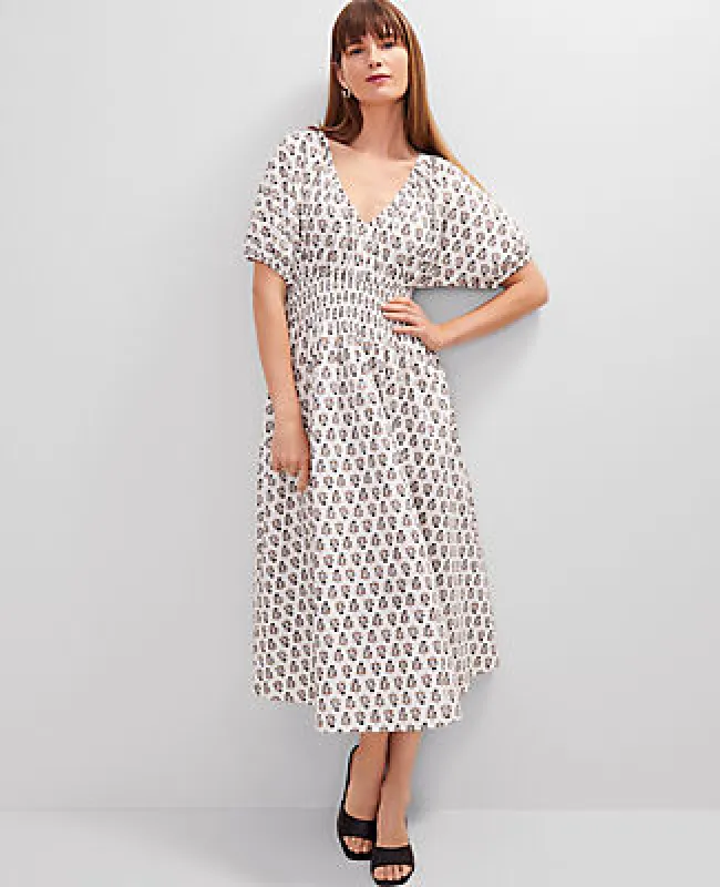Ann Taylor Floral Smocked Puff Sleeve Midi Dress sold by Ann Taylor