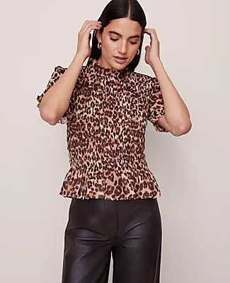 Ann Taylor Animal Print Smocked Ruffled Top sold by Ann Taylor