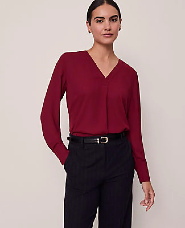 Ann Taylor Mixed Media Pleated Top sold by Ann Taylor