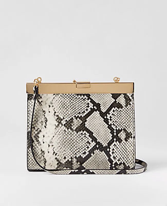 Ann Taylor Snake Print Clutch sold by Ann Taylor