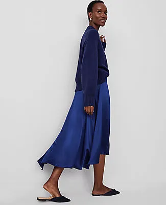 Ann Taylor Studio Collection Asymmetrical Hem Full Midi Skirt sold by Ann Taylor