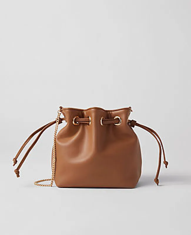 Ann Taylor Mini Drawstring Clutch sold by Ann Taylor