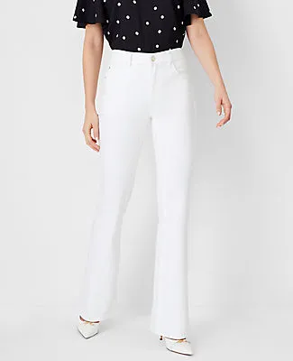 Ann Taylor Mid Rise Boot Jeans in White sold by Ann Taylor