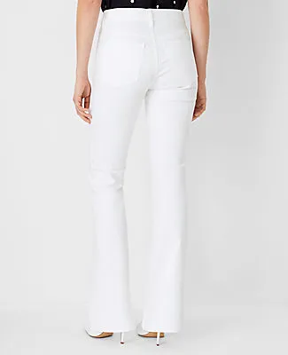 Ann Taylor Mid Rise Boot Jeans in White - Curvy Fit sold by Ann Taylor product image thumbnail 2