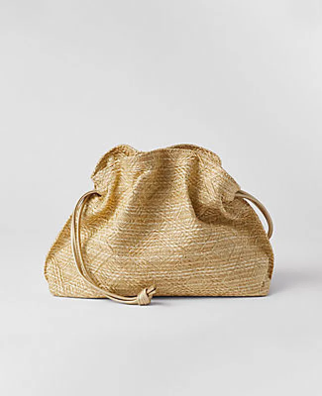 Ann Taylor Metallic Drawstring Clutch sold by Ann Taylor