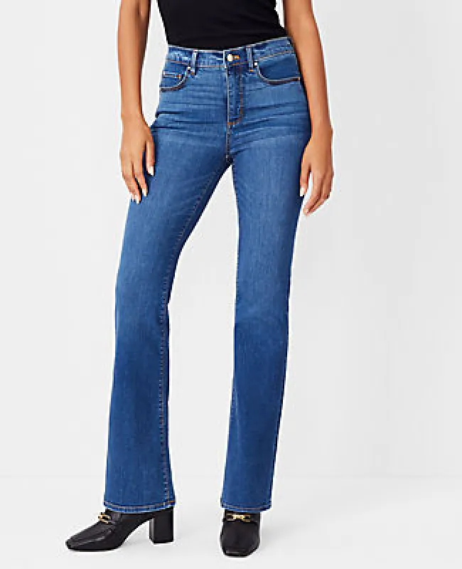 Ann Taylor The Boot Jean in Bright Mid Indigo Wash - Curvy Fit sold by Ann Taylor