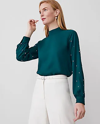 Ann Taylor Petite Embellished-Sleeve Mock-Neck Top sold by Ann Taylor