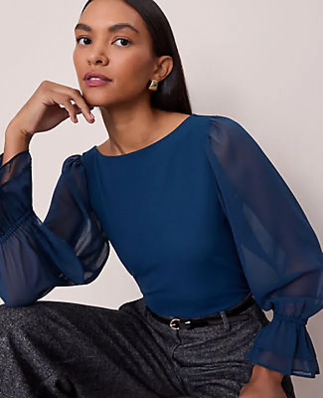 Ann Taylor Mixed Media Pleated Sleeve Top sold by Ann Taylor