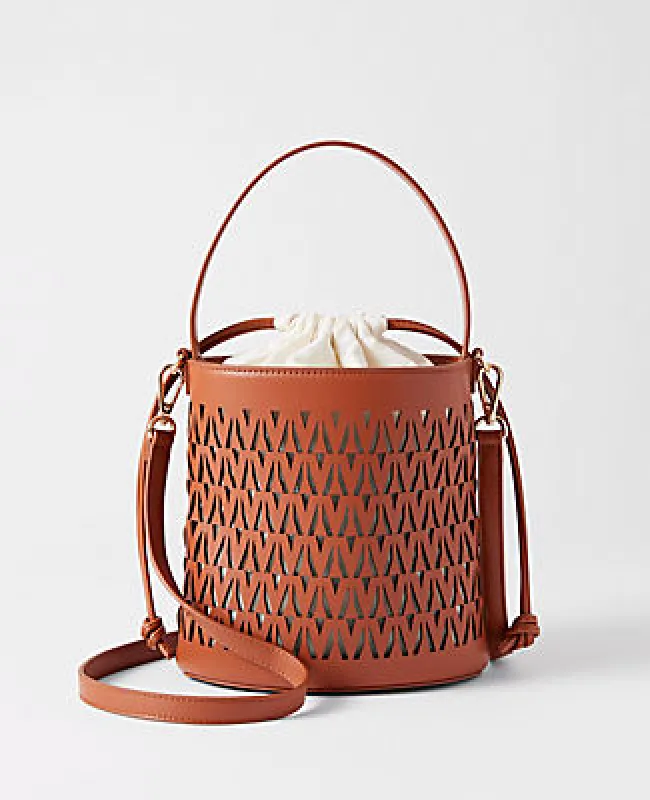 Ann Taylor Weekend Collection Perforated Crossbody Bucket Bag sold by Ann Taylor