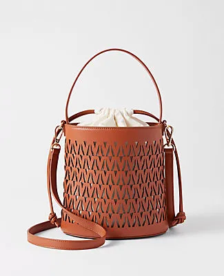 Ann Taylor Weekend Collection Perforated Crossbody Bucket Bag sold by Ann Taylor