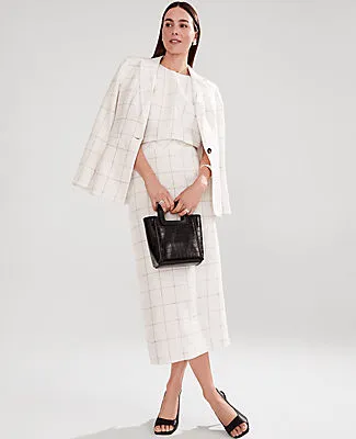 Ann Taylor The Clean Midi Skirt in Windowpane Linen Blend sold by Ann Taylor