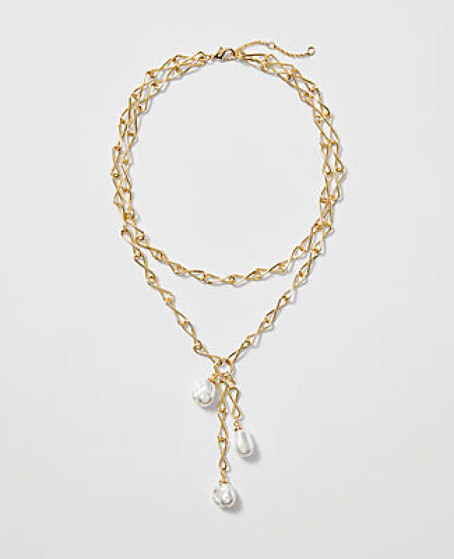 Ann Taylor Triple Pearl Lariat Necklace sold by Ann Taylor