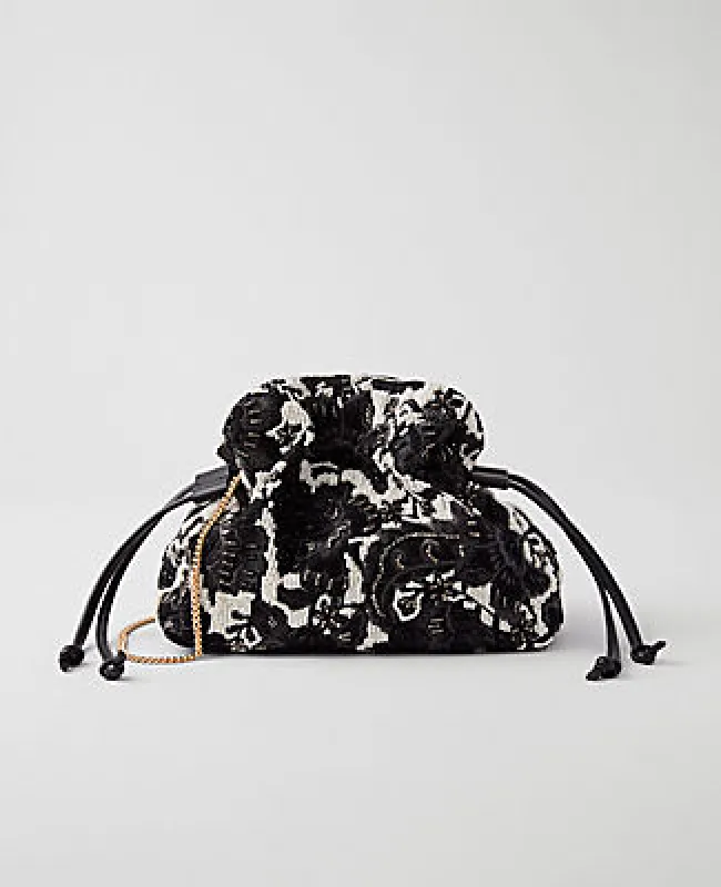 Ann Taylor Beaded Mini Drawstring Clutch sold by Ann Taylor