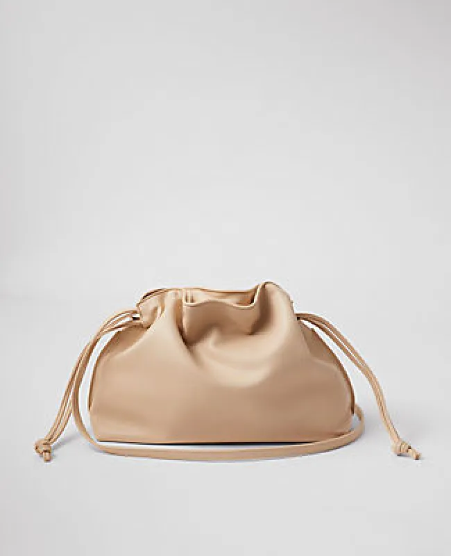 Ann Taylor Drawstring Faux Leather Clutch sold by Ann Taylor