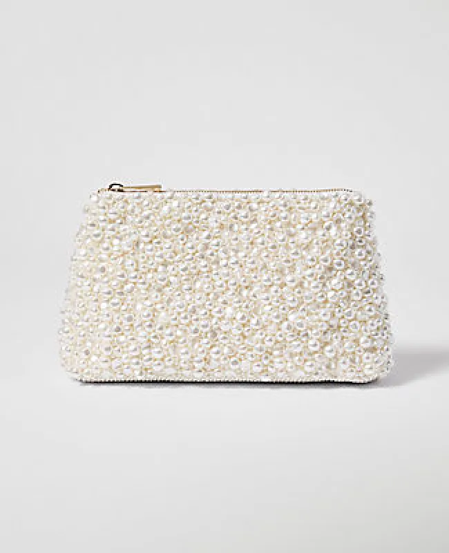 Ann Taylor Pearlized Clutch sold by Ann Taylor