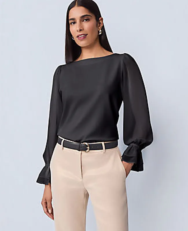 Ann Taylor Mixed Media Pleated Sleeve Top sold by Ann Taylor