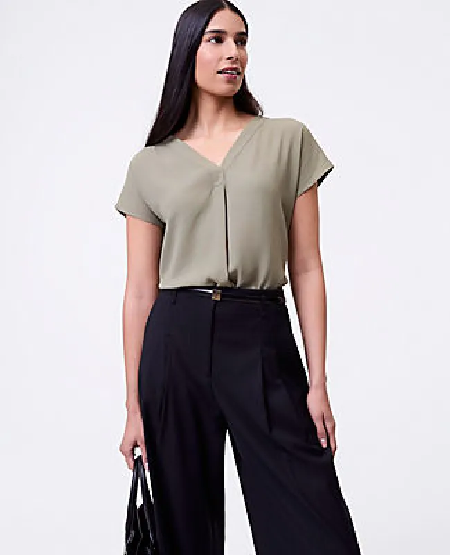 Ann Taylor Mixed Media Pleat Front Top sold by Ann Taylor